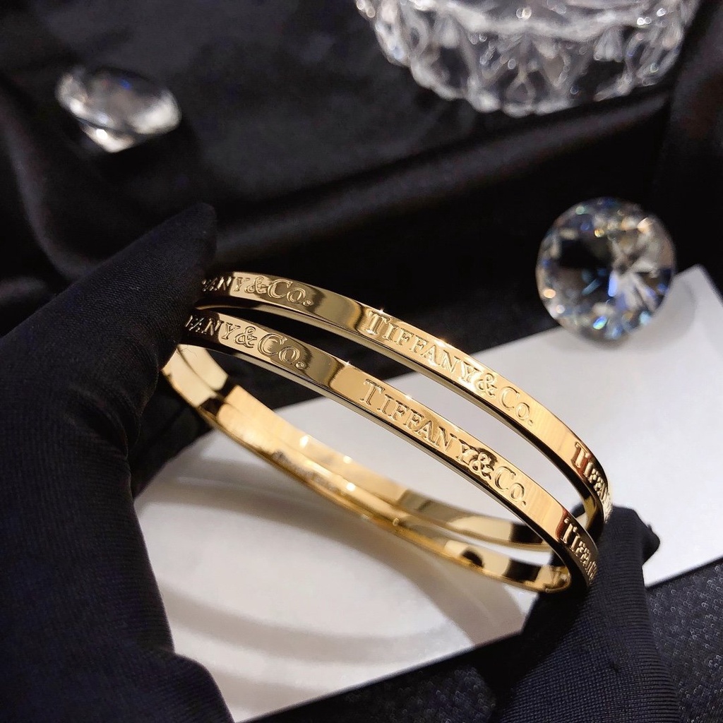 Vòng tay cartier thông thường vòng đeo tay tinh tế rỗng chữ t logo titan thép không thấm nước vòng tay chuỗi không gỉ