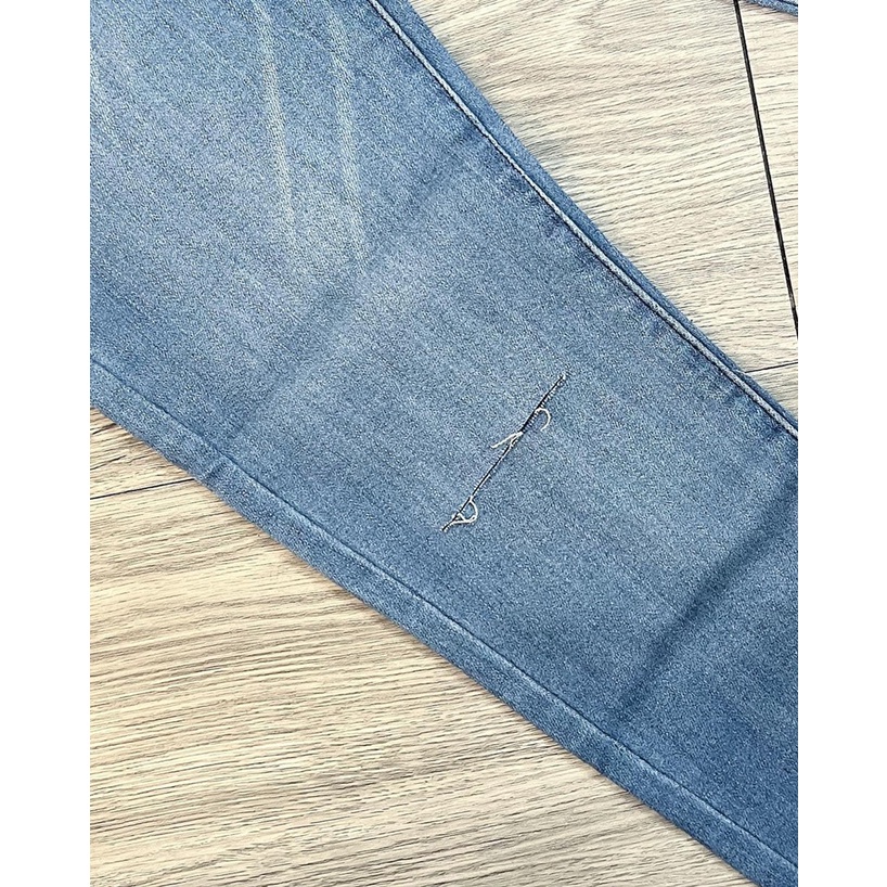Quần Jeans thun rách gối