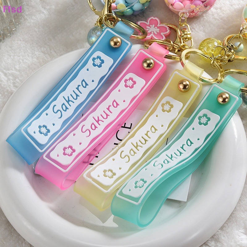 {Ffsd} Móc Khóa Acrylic Hình Kẹo Mút Phối Cát Lún Dầu Bông Tuyết Lấp Lánh Dễ Thương Cho Nữ * Hàng Bán Chạy *