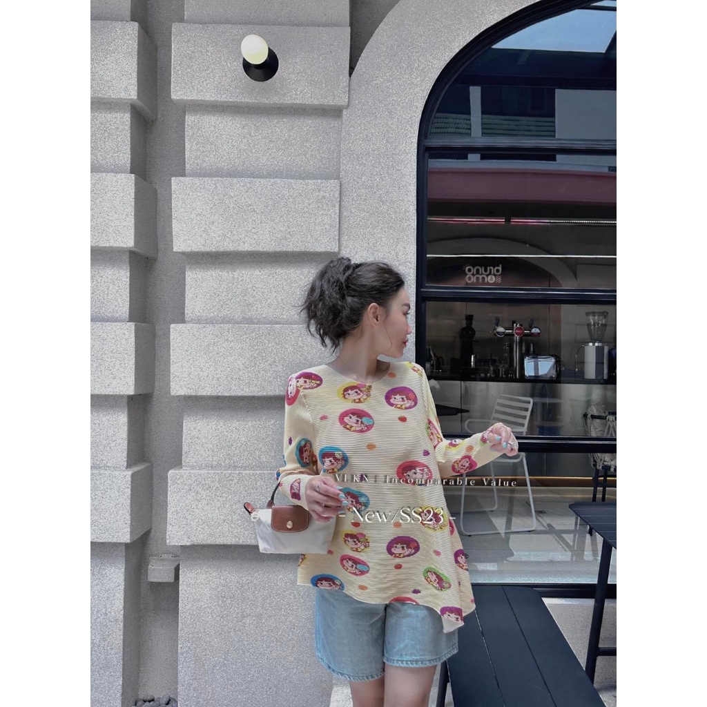 Áo dập ly hoạt hình xéo tà