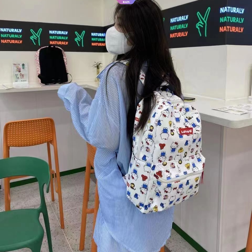 Ba Lô Vải Canvas Nylon Sức Chứa Lớn In Hình Sanrio Hello Kitty Dễ Thương Có Khóa Kéo Thời Trang Cho Nữ