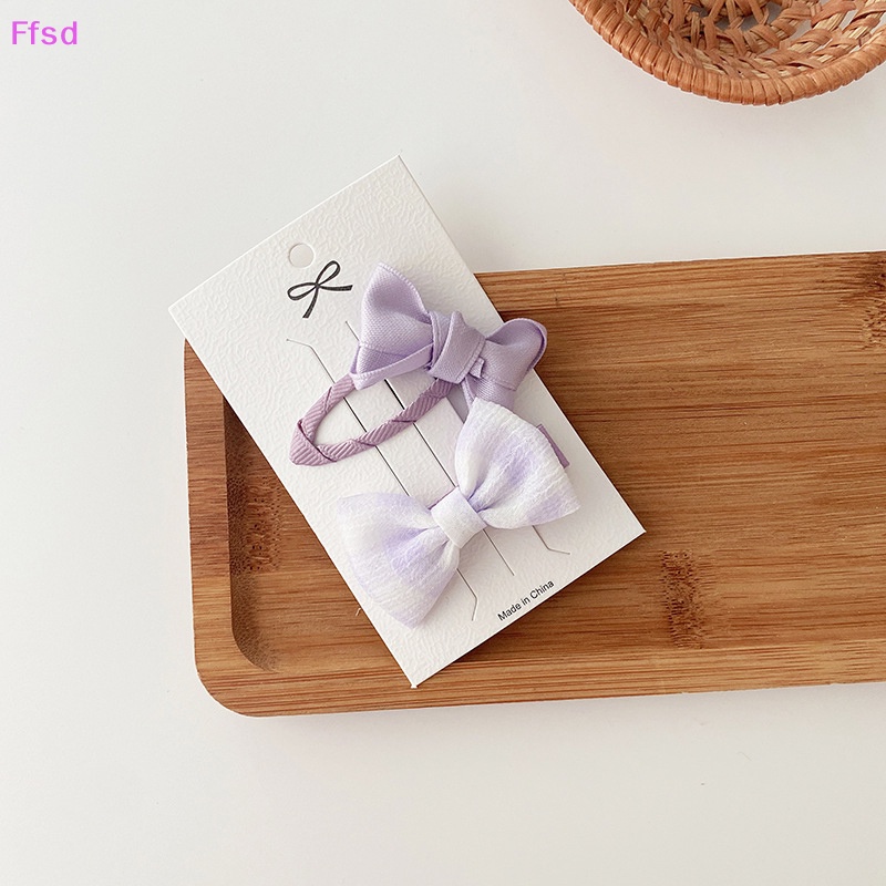 {Ffsd} Bộ 2 Kẹp Tóc Nơ Màu Tím Ngọt Ngào Phong Cách Hàn Quốc Cho Bé Gái