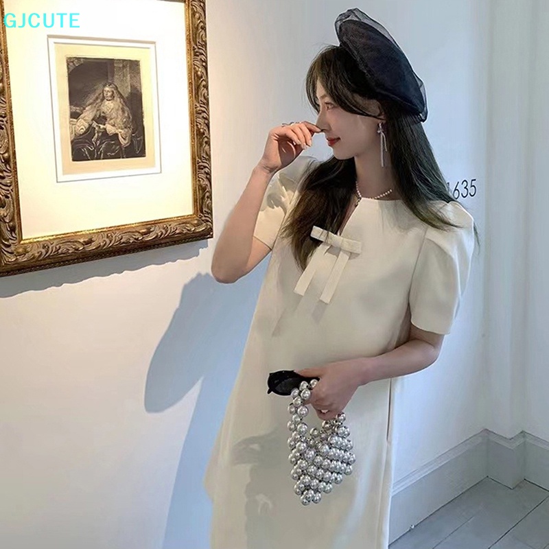 Đầm Mini Dáng Chữ A Cổ Chữ V Màu Trơn Đính Nơ Thời Trang Mùa Hè Cho Nữ