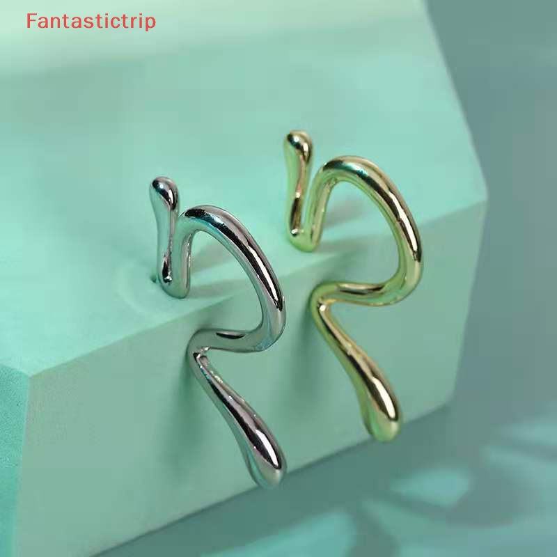 Bông Tai Dạng Kẹp Bằng Kim Loại Thiết Kế Bất Đối Xứng Thời Trang Cho Nam Và Nữ