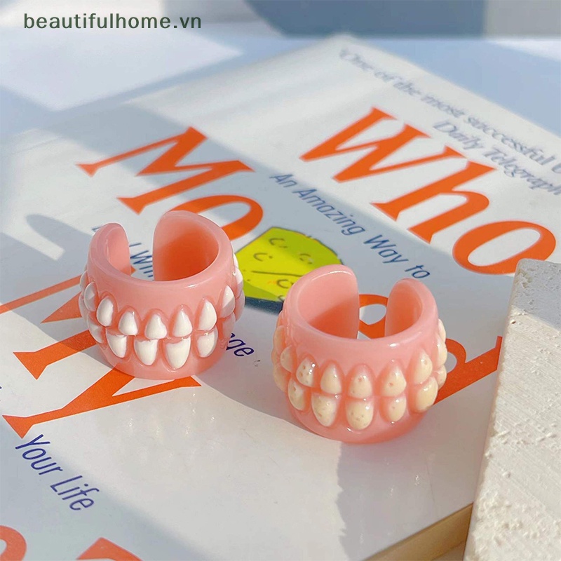 Nhẫn Nhựa Hình Chiếc Răng Sáng Tạo Vui Nhộn Thời Trang Hàn Quốc Cho Nam Nữ