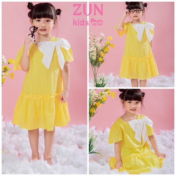 Váy vàng nơ trắng ZUNKIDS