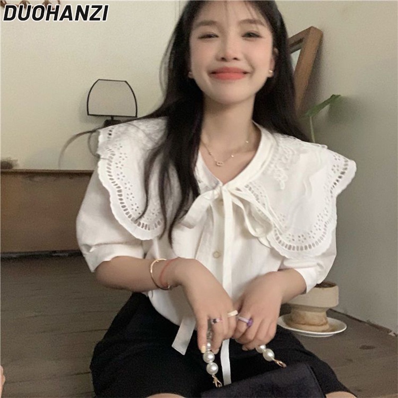 DUOHANZI áo sơ mi nữ búp bê trắng cổ áo phồng tay áo sơ mi nữ mặc mùa hè 2022 thiết kế mới sense small sense sweet girly tops
