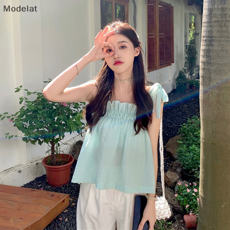 Áo Hai Dây Mùa Hè Dáng Suông Cột Nơ Màu Trơn Ngọt Ngào Cho Nữ