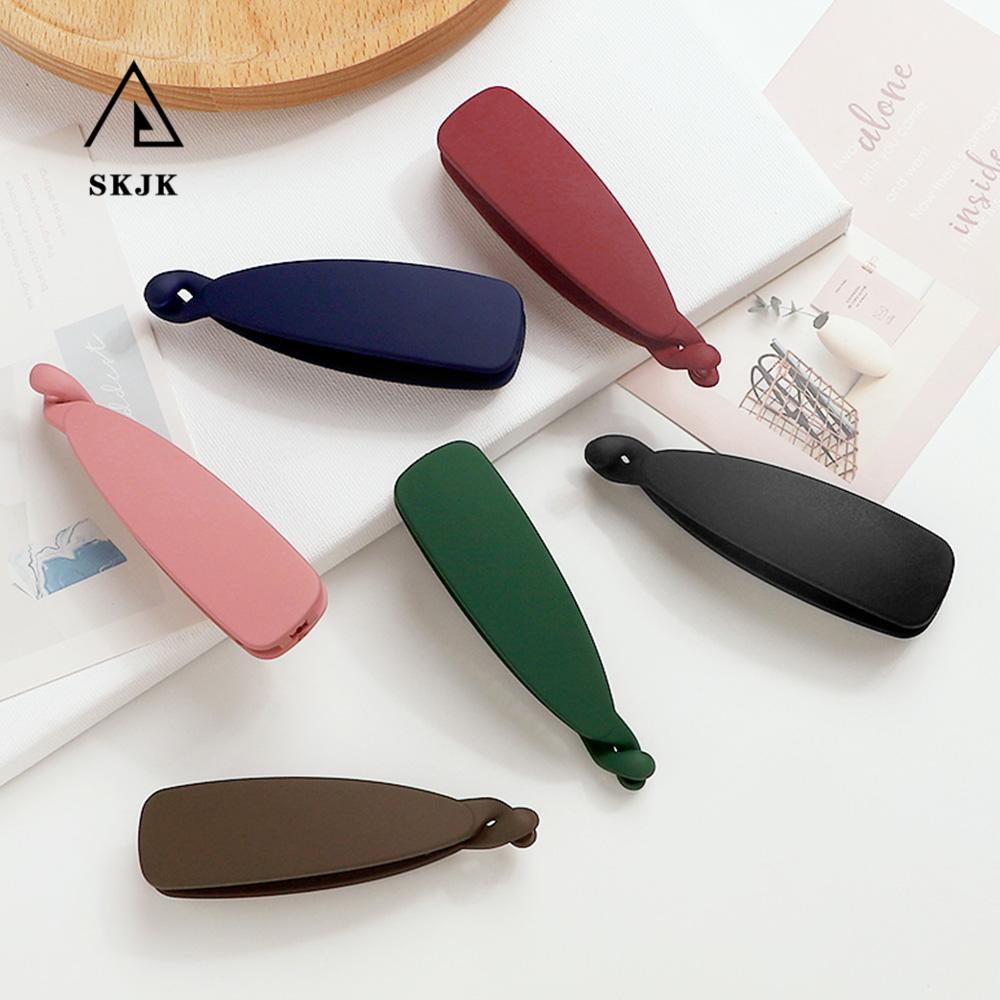 Giá Đỡ Kẹp Tóc Đuôi Ngựa Màu Trơn Thời Trang