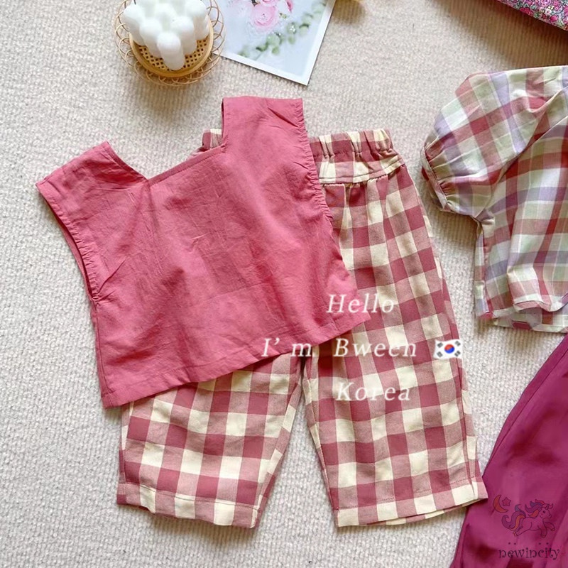 Set Đồ Mùa Hè 2 Món Gồm Áo Cổ Vuông Hở Lưng Màu Trơn + Quần Dài Eo Thun Kẻ Sọc Caro Cho Bé Gái