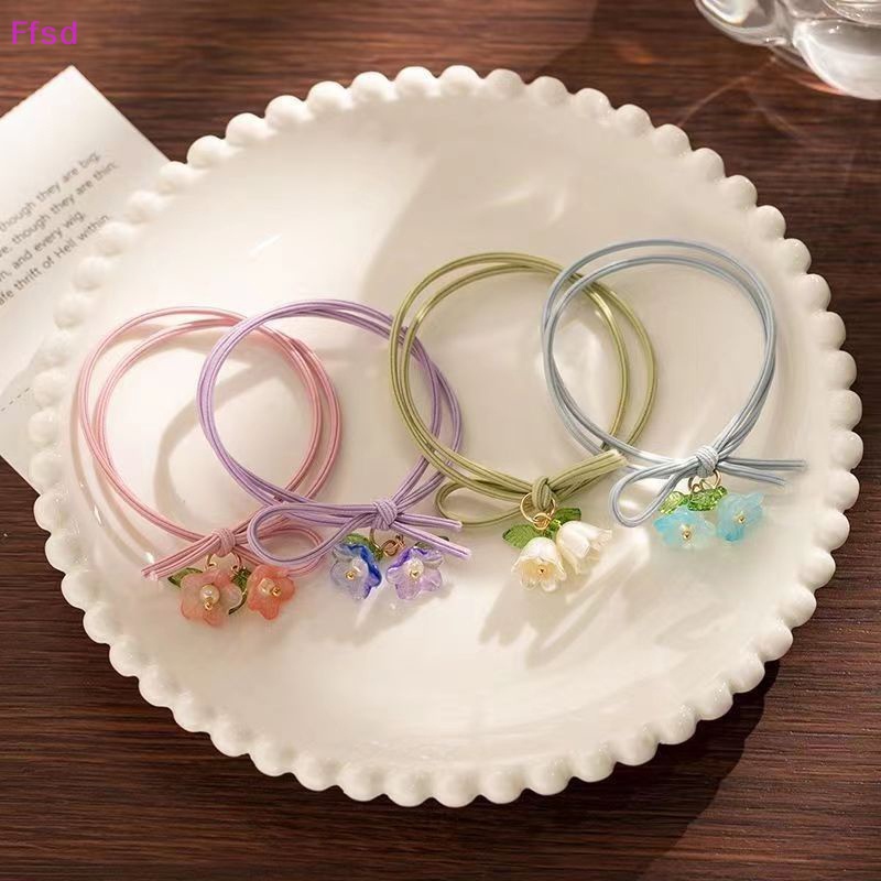 {Ffsd} Set 2 Vòng Tay Dây Co Giãn Mặt Hoa Màu Xanh Lá / Hồng Ngọt Ngào Cho Nữ