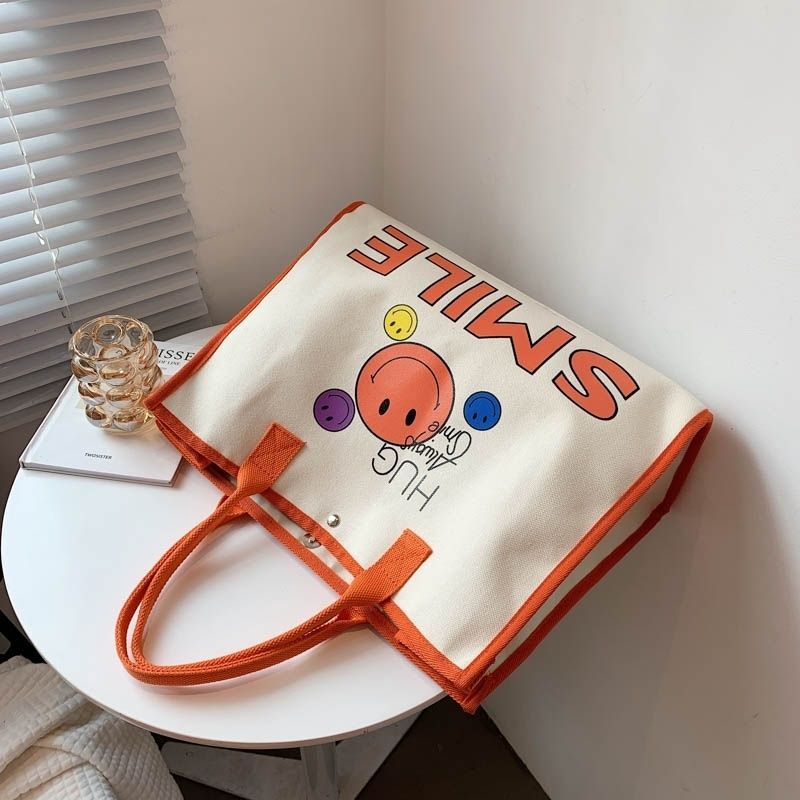 Túi Tote Đeo Vai Mùa Hè 2023 Bằng Vải Bạt In Họa Tiết Mặt Cười Phong Cách Mới Dễ Phối Đồ Cho Nữ
