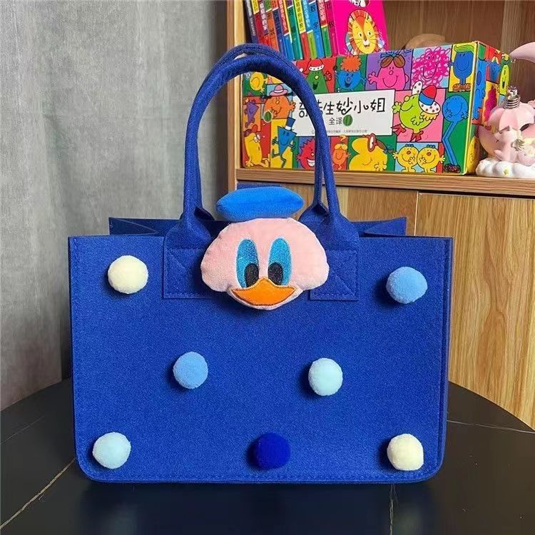 Phim hoạt hình phim hoạt hình túi nỉ one-year-old túi xách lưu niệm cho bé hàng tháng túi lưu niệm diy felt gift bag bán buôn