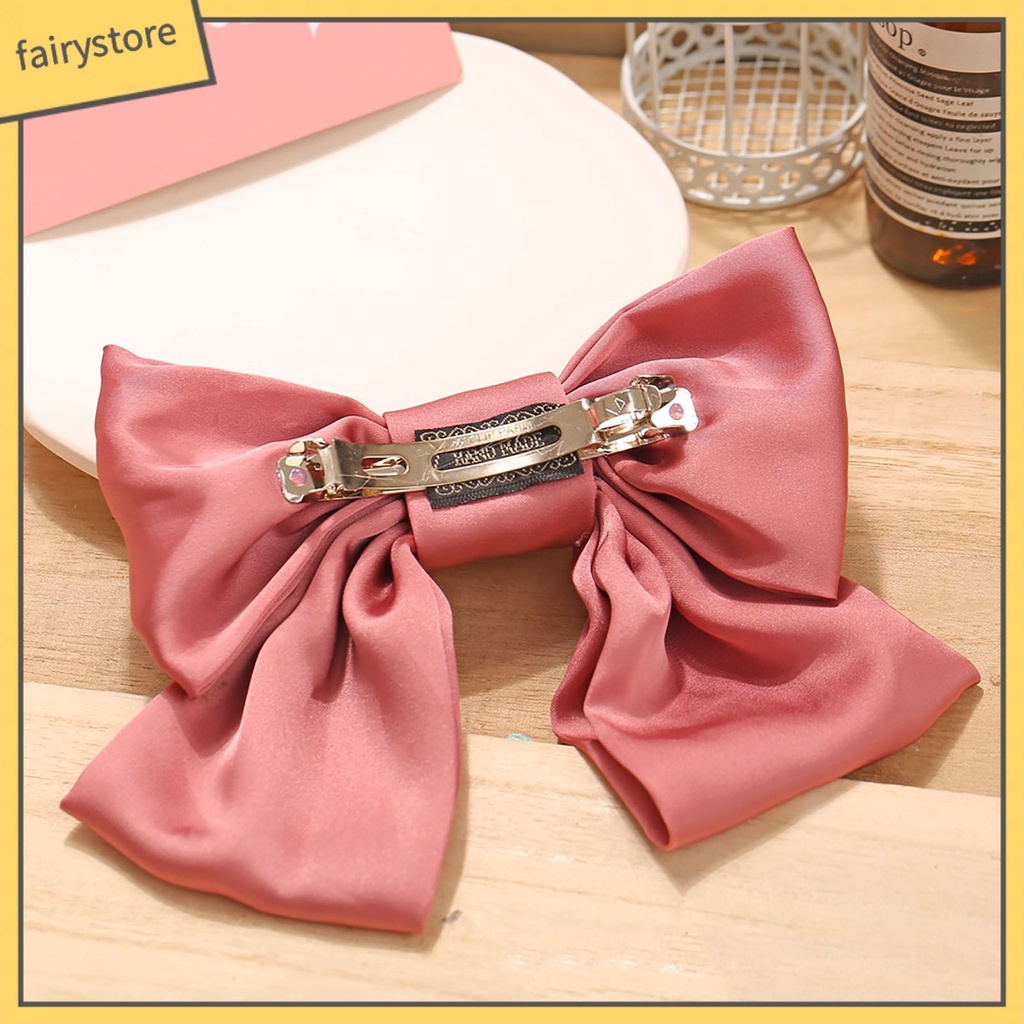 Kẹp Tóc Hình Nơ Co Giãn Màu Sắc Đơn Giản Cho Bé