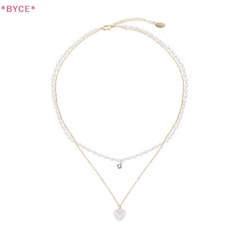 Vòng cổ Mặt Hình Trái Tim Đính Ngọc Trai Nhân Tạo Thời Trang Dành Cho Nữ Mới