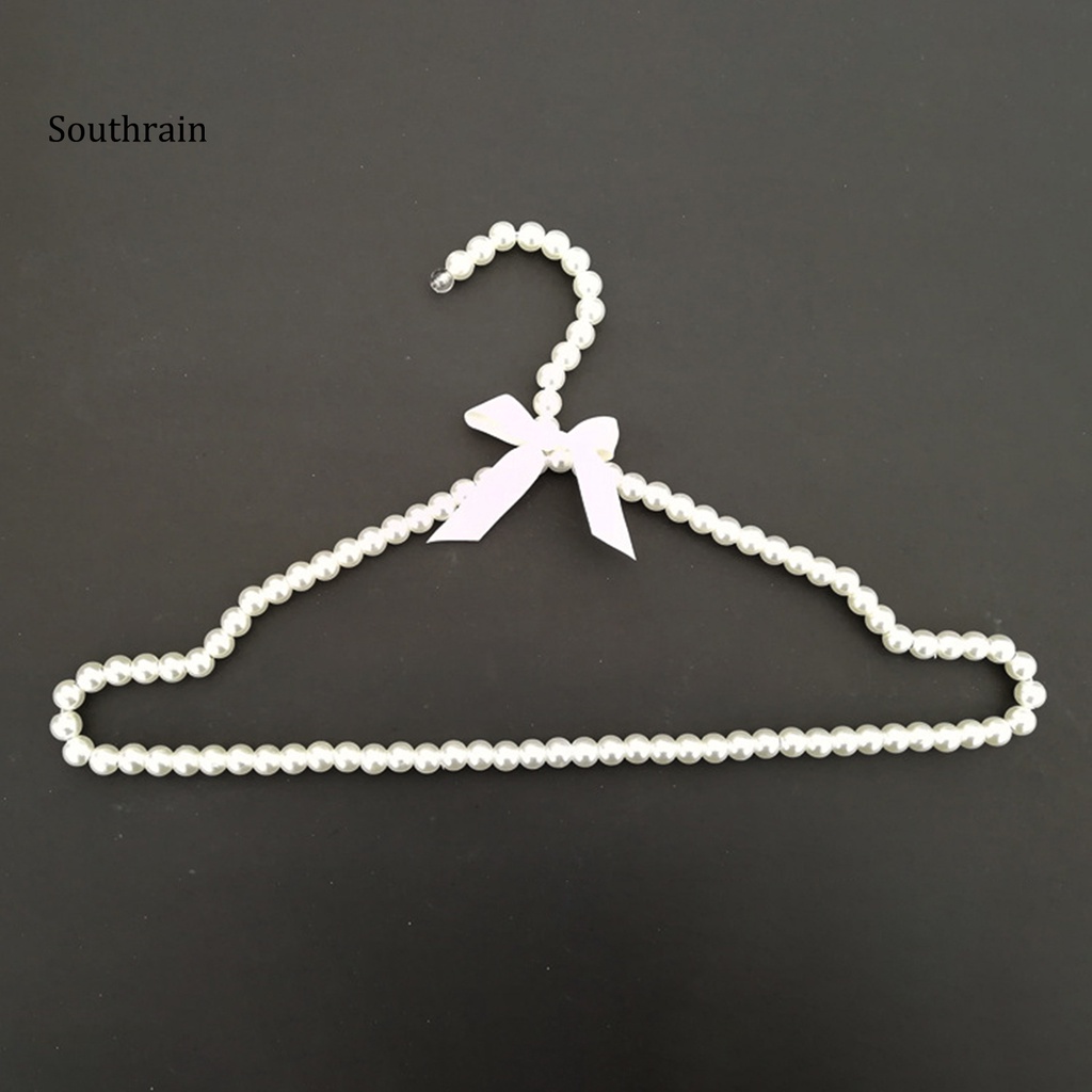 Set 2 Móc Treo Quần Áo Đính Nơ Và Ngọc Trai Nhân Tạo Bằng Nhựa Tiện Lợi