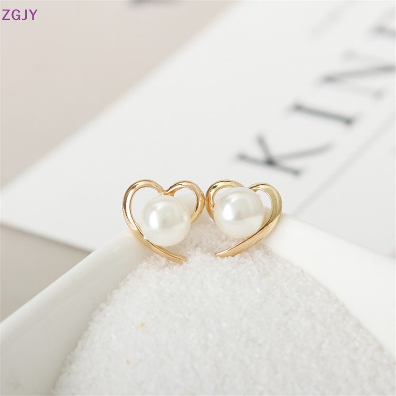Khuyên Tai Hình Trái Tim Đính Ngọc Trai Nhân Tạo Màu Vàng Thời Trang Cho Nữ Mới