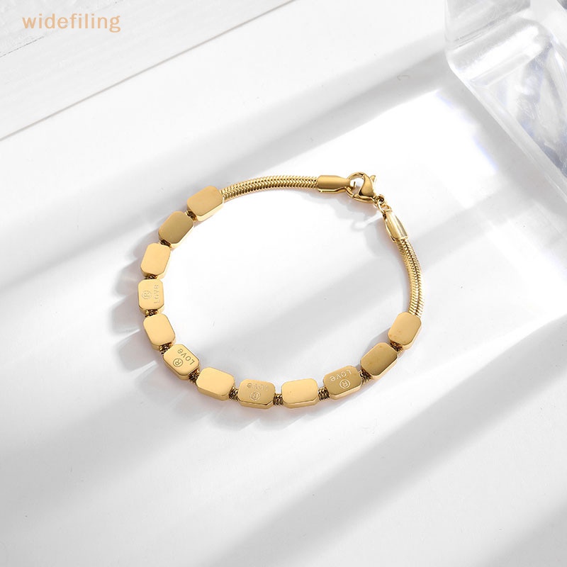 Vòng Đeo Tay Bằng Thép Titan Mặt Khối Lập Phương Màu Sắc Vàng Kim Phong Cách Vintage Dành Cho Nữ