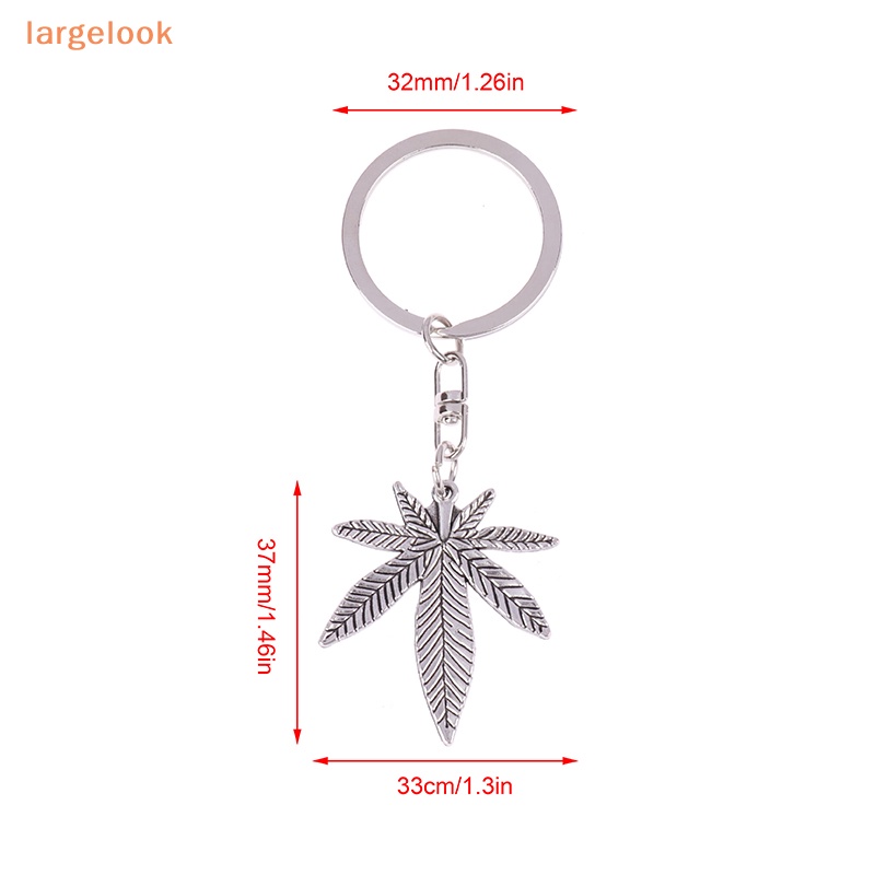 Móc Khóa Kim Loại Hình Lá Phong Màu Bạc Thời Trang