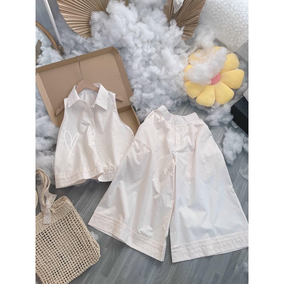 Set áo peplum cổ sơmi sát nách + quần suông rộng kem