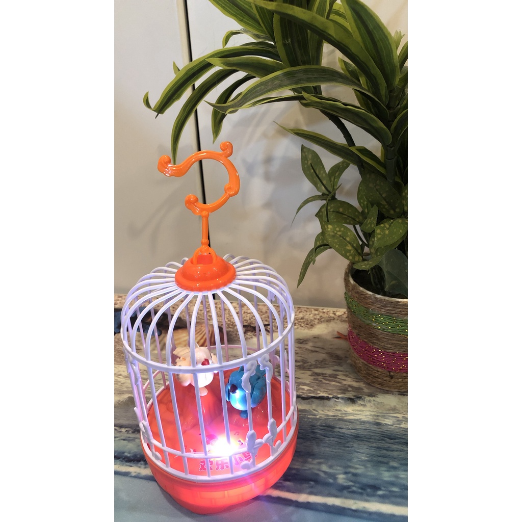 Đồ chơi lồng chim cho bé, lồng chim hót có nhạc và ánh sáng, cảm biến phát tiếng kêu khi rung động