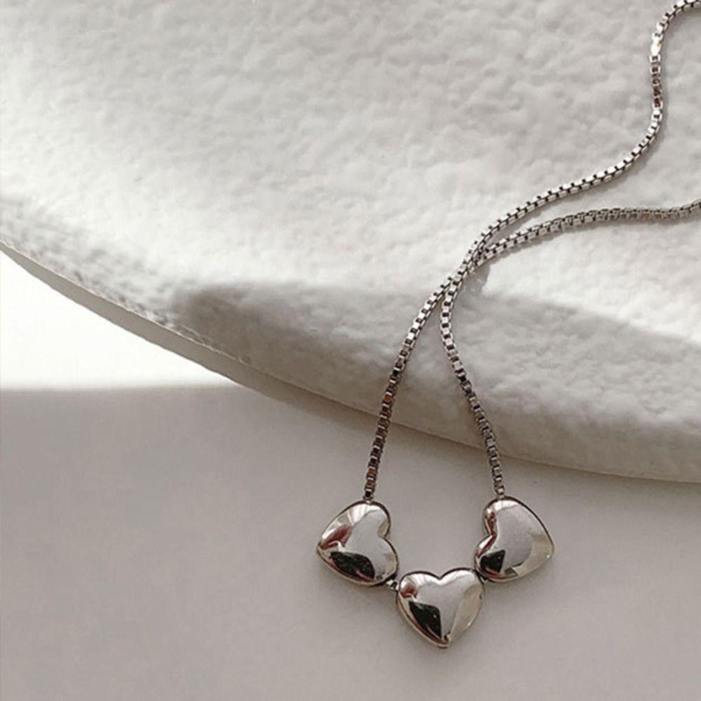 Vòng Tay Hai Lớp Bằng Thép Titan Mặt Hình Trái Tim Đơn Giản Cho Nữ