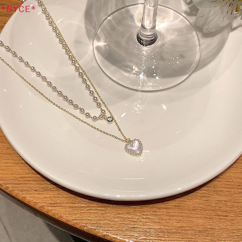 Vòng cổ Mặt Hình Trái Tim Đính Ngọc Trai Nhân Tạo Thời Trang Dành Cho Nữ Mới