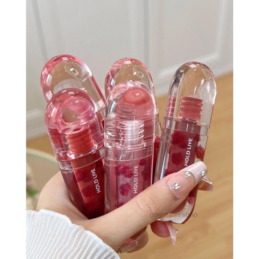 Son bóng Hold Live Wild Flower HL676 mềm môi căng mọng hương đào ngọt ngào chất son gel dưỡng ẩm hiệu ứng bling bling