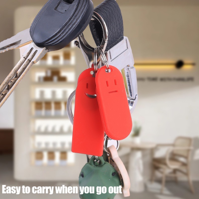 Móc Khóa Kiêm Dụng Cụ Tháo SIM Chống Thất Lạc Hình Mặt Cười Dễ Thương