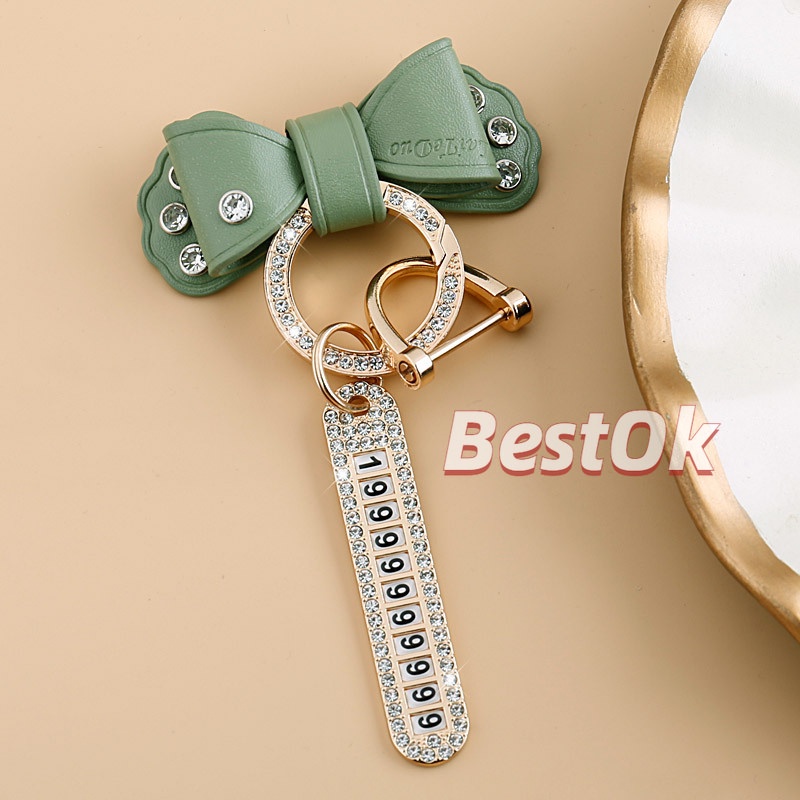 Móc Khóa Da Đính Đá Kim Loại Màu Vàng Hình Nơ Dễ Thương Có Biển Số Cho Nam Và Nữ