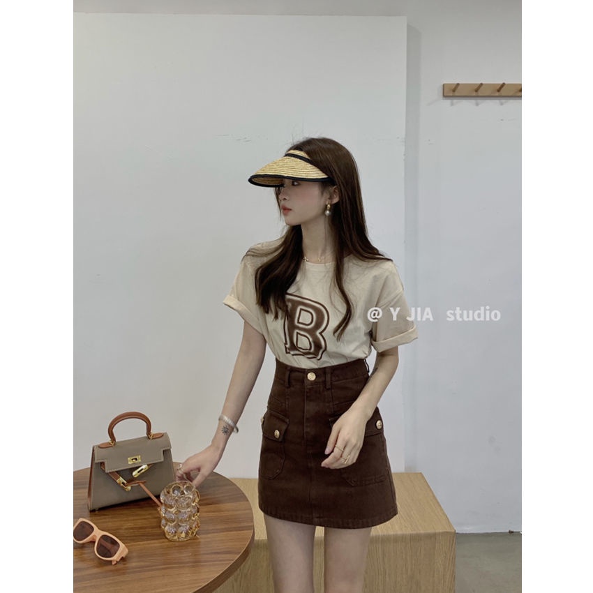 Bộ Áo Thun Tay Ngắn Dáng Rộng In Chữ + Chân Váy Ngắn Lưng Cao Thời Trang Mùa Hè 2023 Mới Chất Lượng Cao Cho Nữ