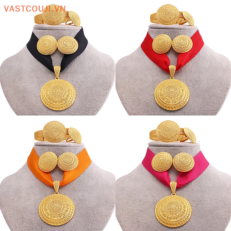 Bộ Trang Sức Gồm Vòng cổ / Bông Tai / Nhẫn / Vòng Tay Màu Vàng Đồng Cỡ Lớn Phong Cách Châu Phi Thời Trang