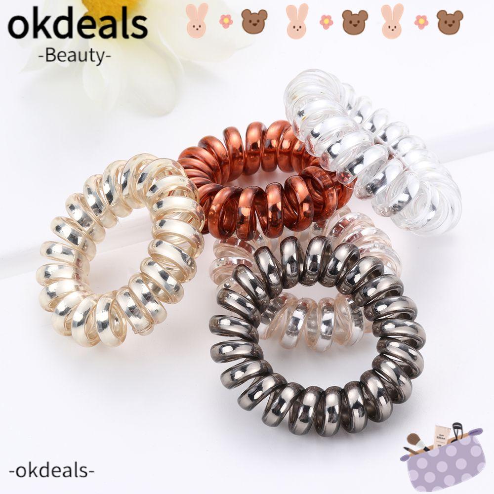 Dây cột tóc dạng lò xo màu ánh kim có độ đàn hồi cao