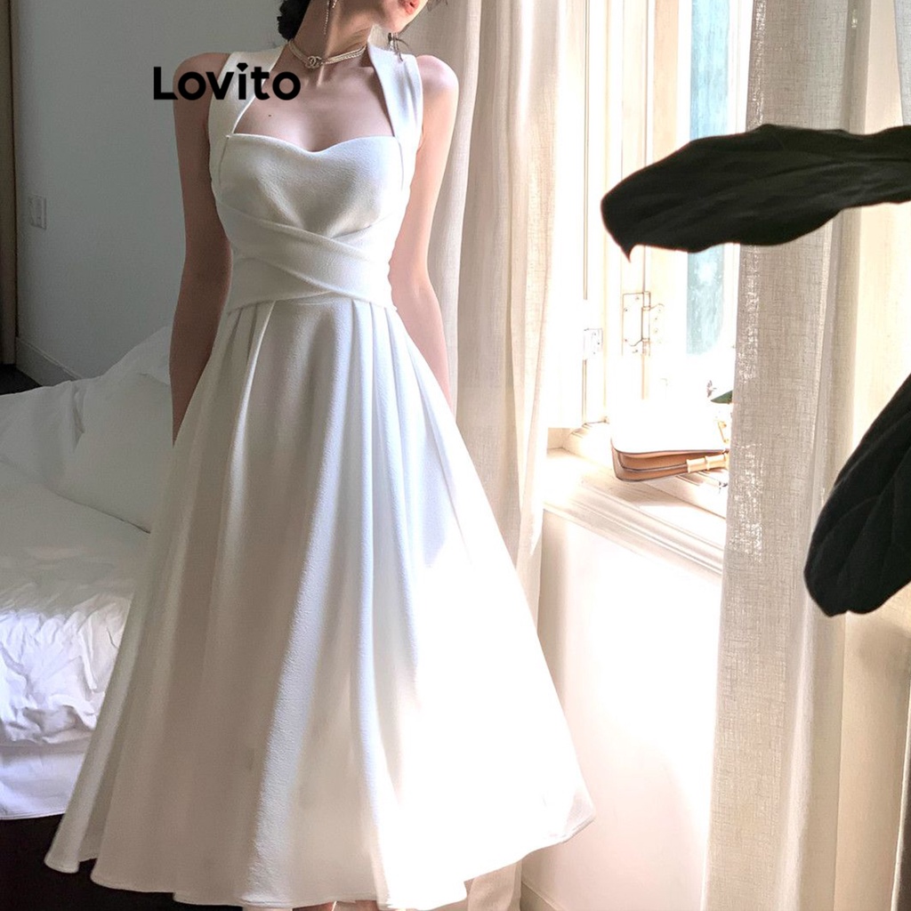 Đầm Lovito phối dây chéo cột nơ lưng màu trơn thường ngày cho nữ LNA19217