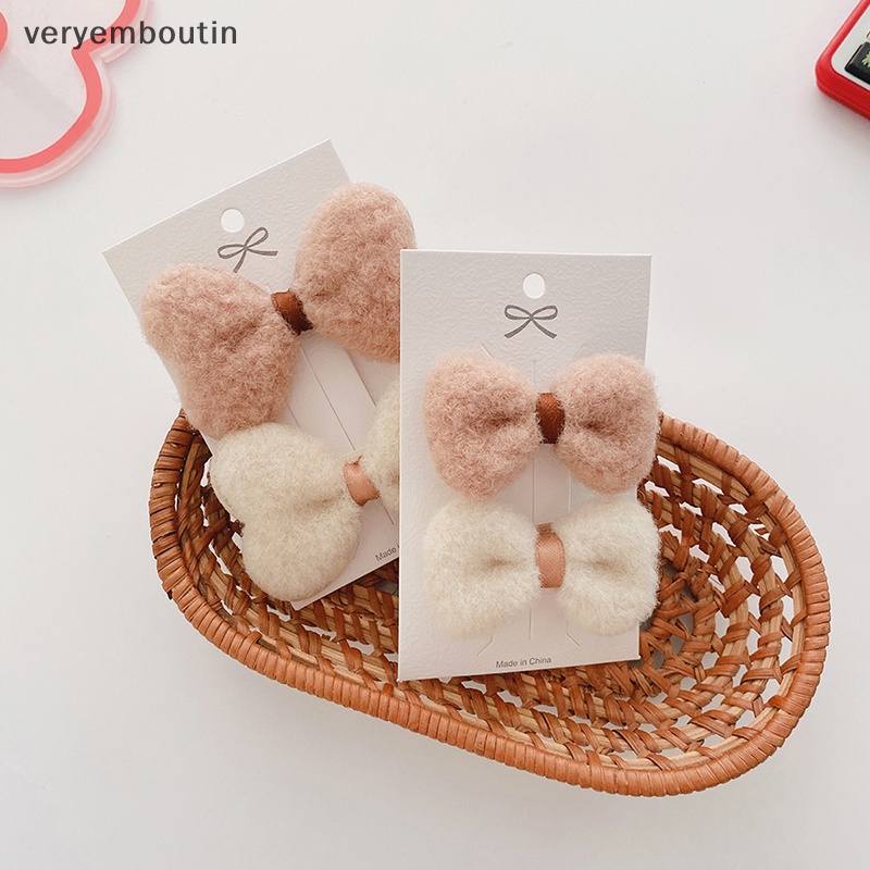 Bộ 2 Kẹp Tóc Vải Lông Mềm Đính Nơ Xinh Xắn Cho Bé Gái
