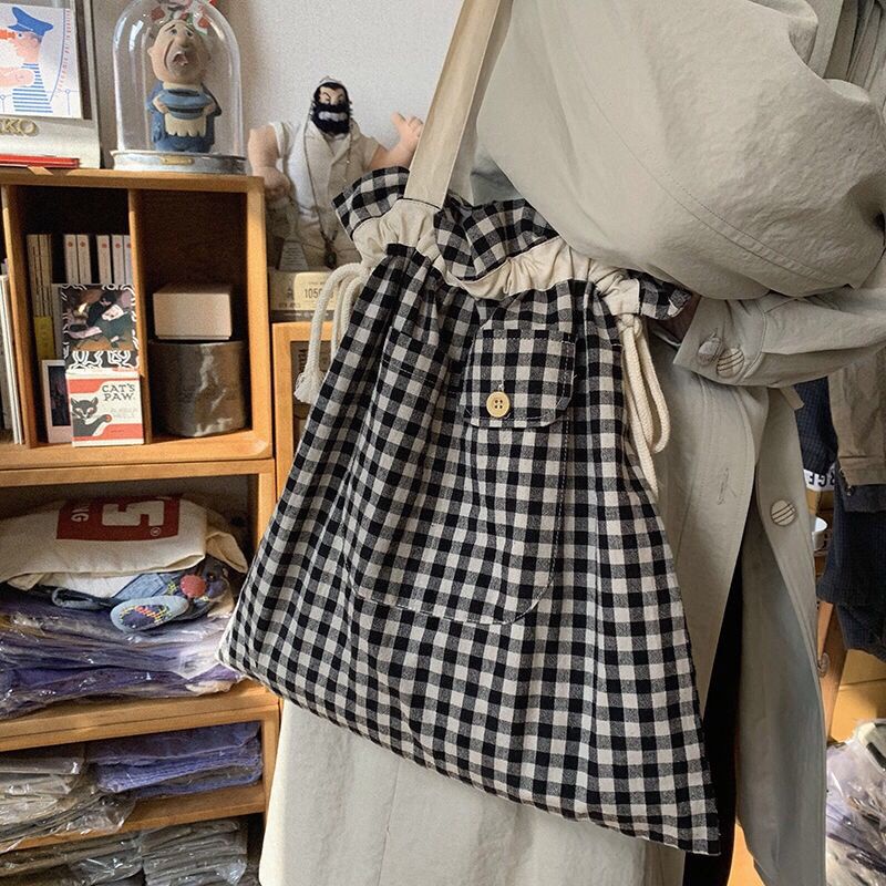 Kiểm tra dây rút túi vải dây rút one-shoulder canvas bag