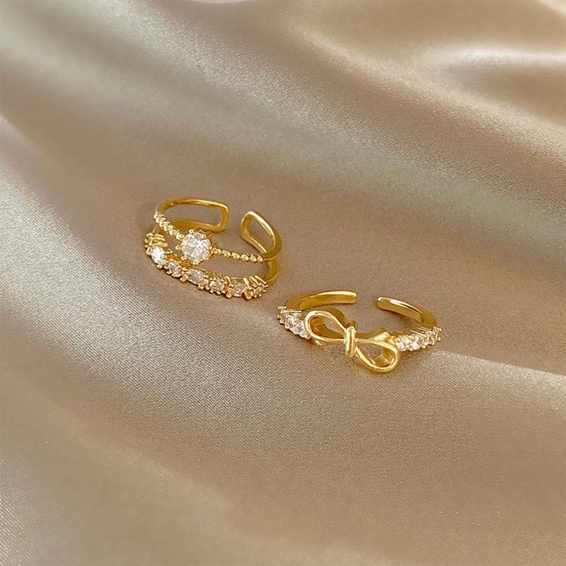 Ygt Bộ 2 Nhẫn Xếp Chồng Lên Nhau Đính Đá Zirconia Hình Nơ Đơn Giản Cá Tính Có Thể Điều Chỉnh Kích Thước Thời