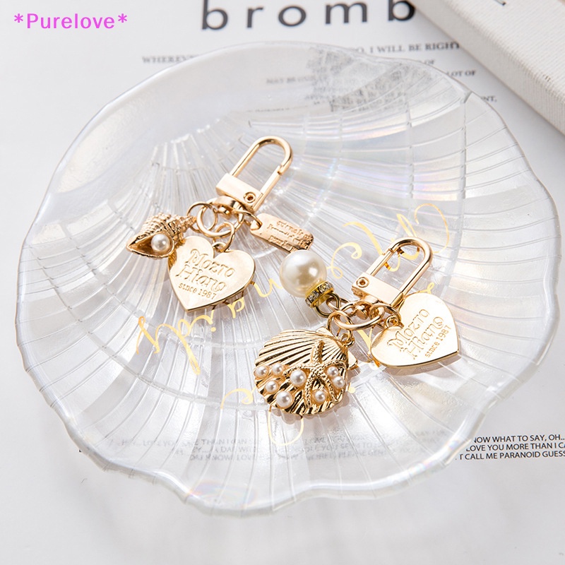 Móc Khóa Hình Vỏ Sò Đính Ngọc Trai Thời Trang Dành Cho Nữ