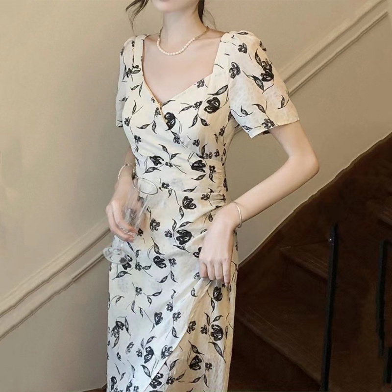 Váy hoa nơ tay ngắn hở lưng Đầm cổ chữ V rỗng ra lưng phong cách Pháp nữ tính khí Váy dài trung bình mùa hè