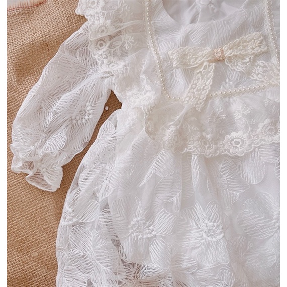 Body váy trắng cổ ren nơ cho bé gái