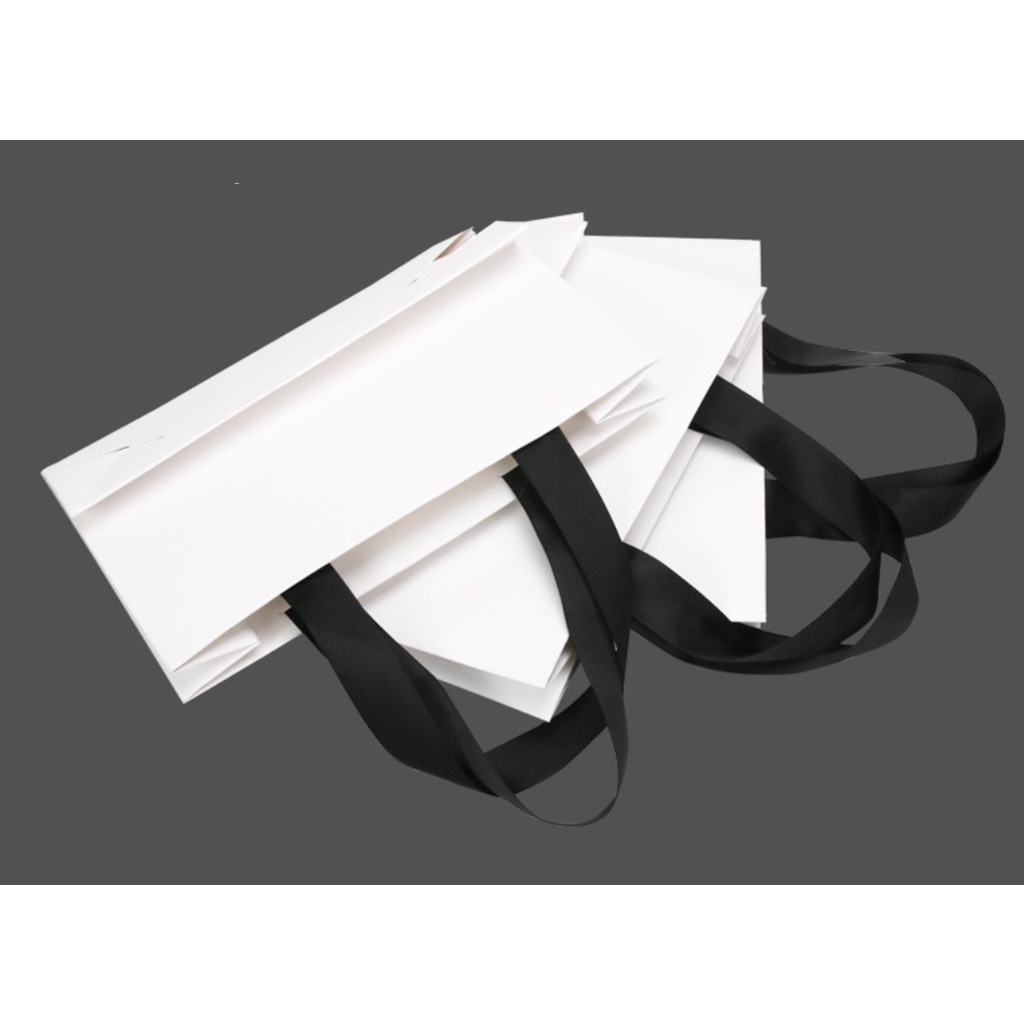 Túi giấy quai vải dán ẩn