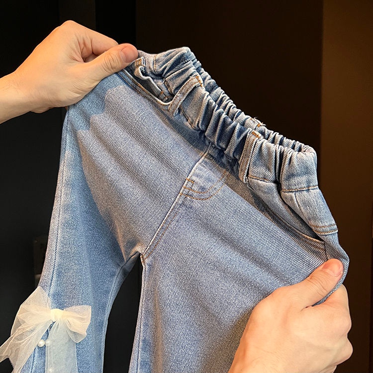 Quần Jean Ống Loe Thắt Nơ Đính Ngọc Trai Thời Trang Mùa Xuân Cho Bé Gái