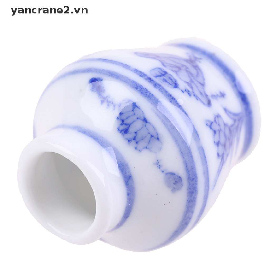 Bình Hoa Sứ Màu Trắng Xanh Dương Thu Nhỏ Xinh Xắn 1 / 12 {yancrane2.vn}