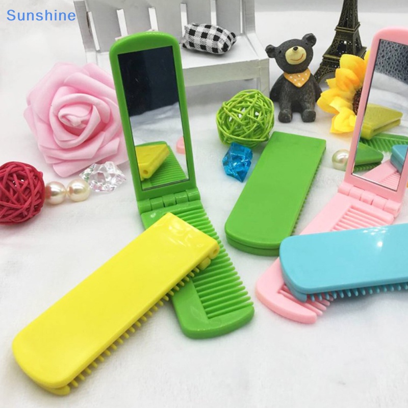 1 Lược Gấp Gọn Có Gương Trang Điểm Tiện Dụng Khi Đi Du Lịch