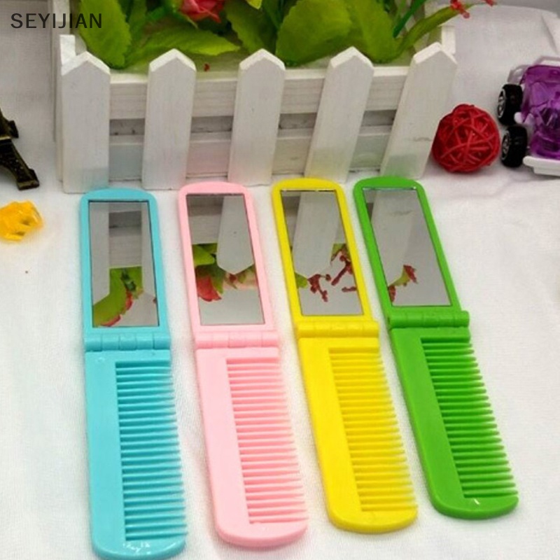 1 Lược Gấp Gọn Có Gương Trang Điểm Tiện Dụng Khi Đi Du Lịch