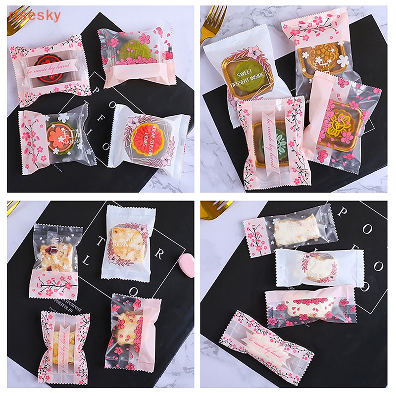 Set 100 / 200 Túi Đựng Bánh Quy / Kem Nền DIY Hình Hoa Anh Đào