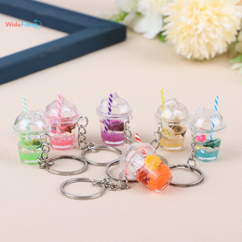 Widefiling 1pc thời trang sáng tạo nhỏ phát sáng sữa bong bóng cốc trà móc khóa cho phụ nữ đàn ông túi dễ thương mặt dây chuyền xe chìa khóa vòng trang sức quà tặng đẹp
