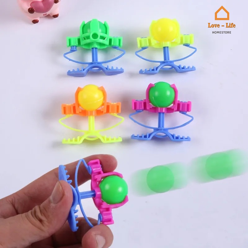 1 piece creative finger launching mini plastic ball đồ chơi tương tác trẻ em ngoài trời / hướng dẫn sử dụng thú vị máy bắn đá quả bóng nhỏ lễ hội hoạt động đồ chơi