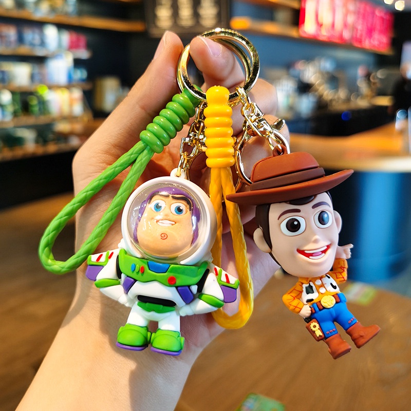 Móc Chìa Khóa Silicon Hình Hoạt Hình Toy Story Ba Mắt Cho Học Sinh