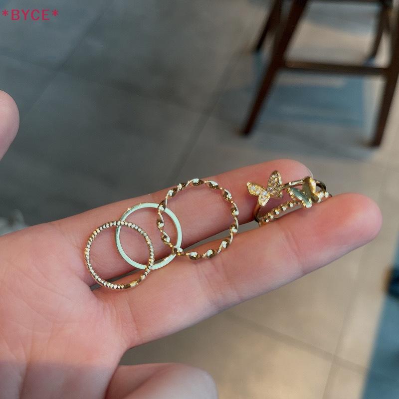 Bộ 4 Nhẫn Hình Tròn Họa Tiết Bướm Màu Bạc Tùy Chỉnh Thời Trang Cho Nữ Mới